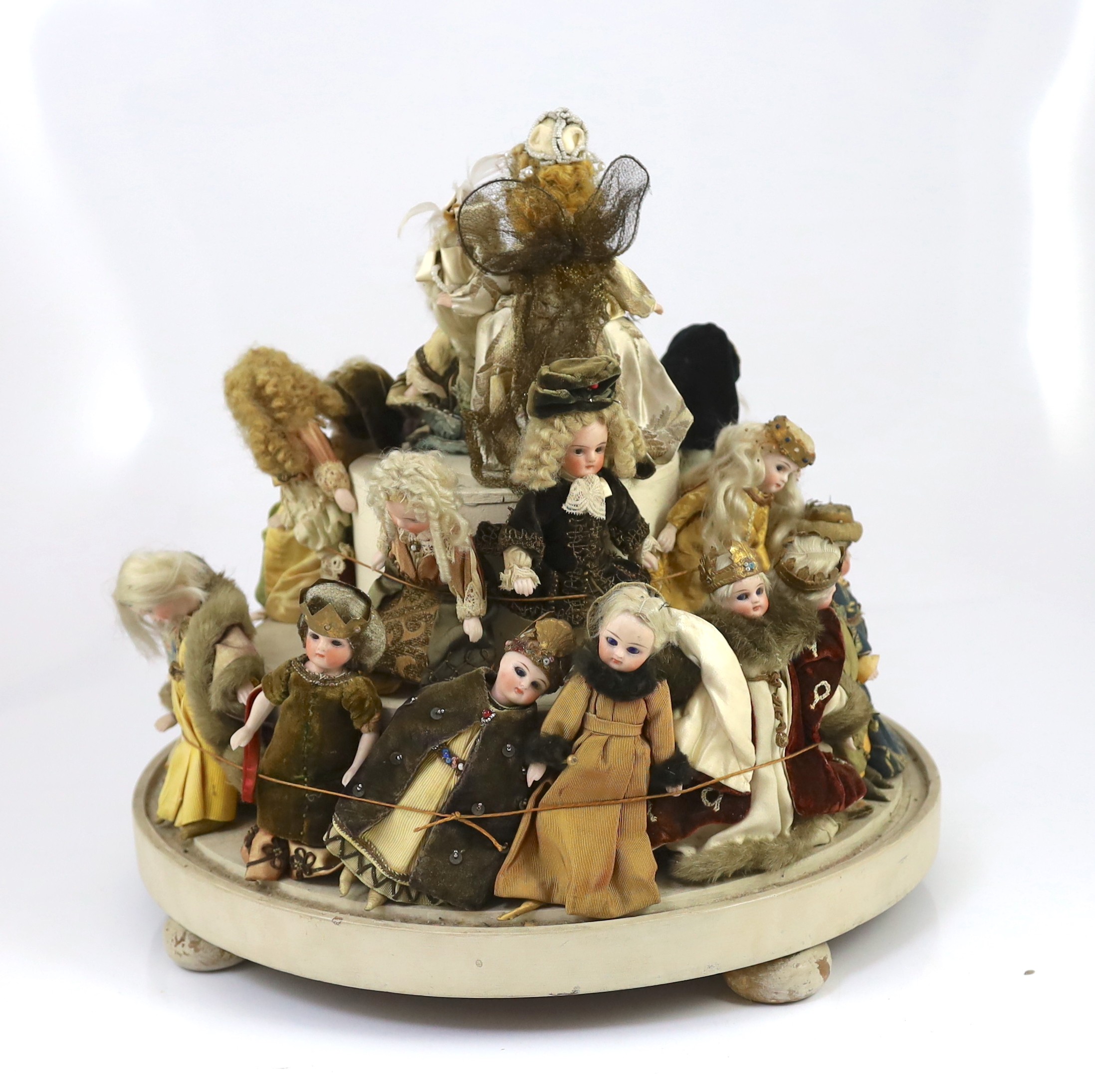 A rare collection of twenty-three German all-bisque dolls, circa 1910